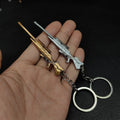 Metal Araxys Operator Gun Tiny Keychain Pendant