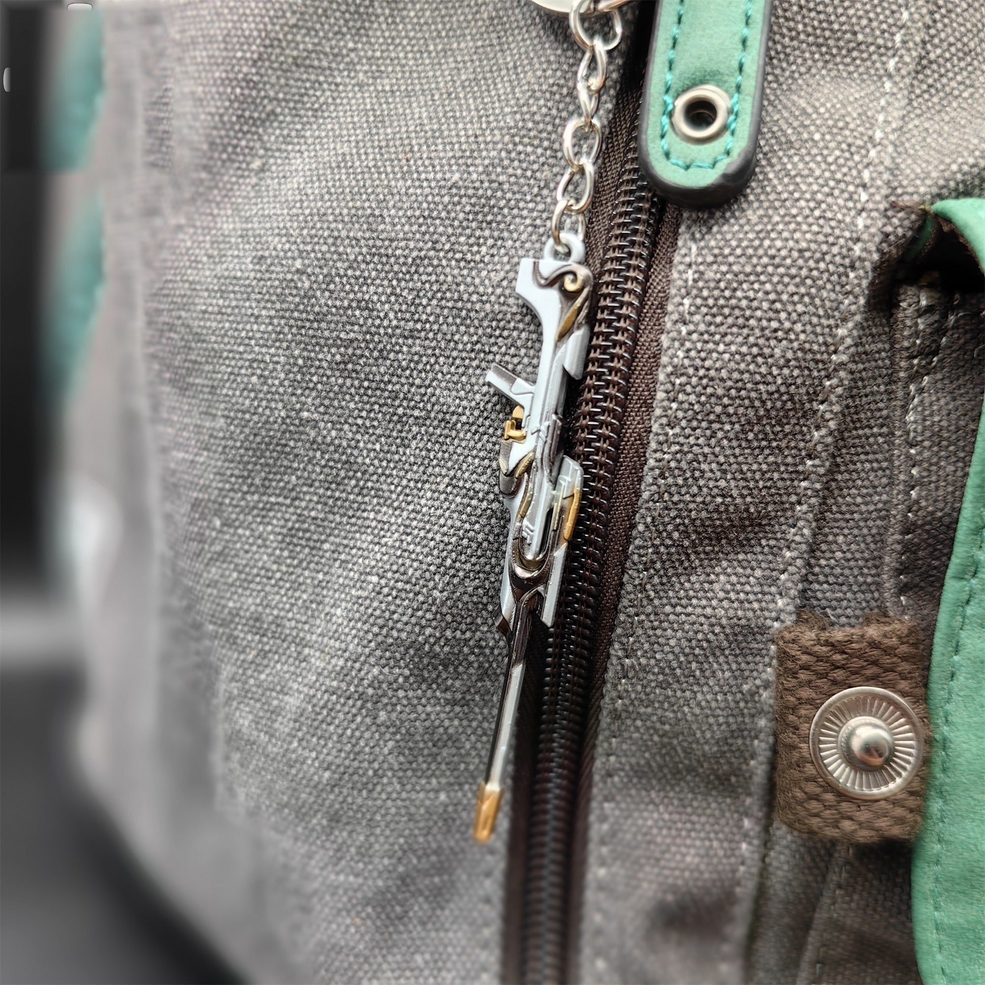 Metal Tilde Operator Gun Tiny Keychain Pendant