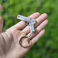 Tiny Spectrum Classic Pistol Gun Metal Keychain