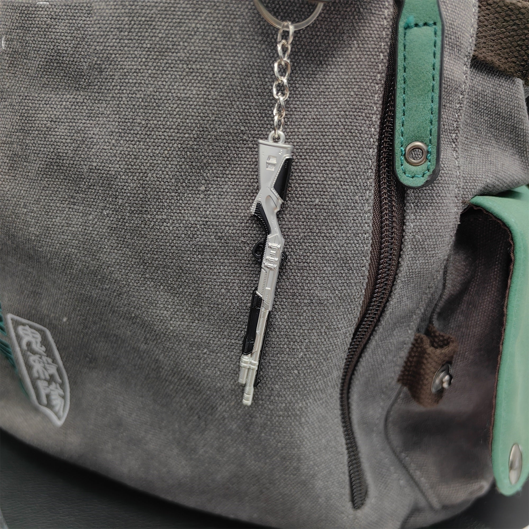 Tiny Radiant Crisis 001 Bucky Gun Metal Keychain